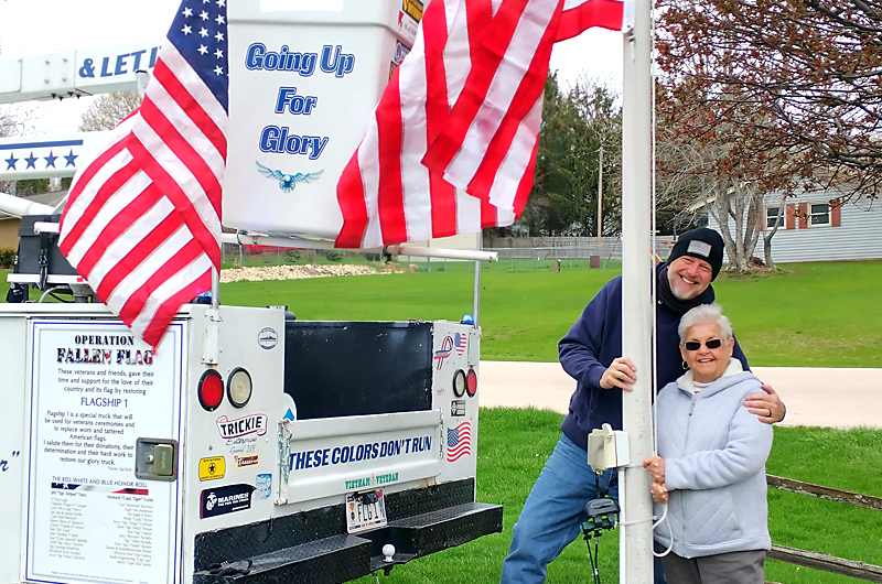 Replacing a flag and flagpole.